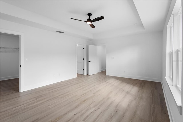 interior space featuring light wood-type flooring and ceiling fan