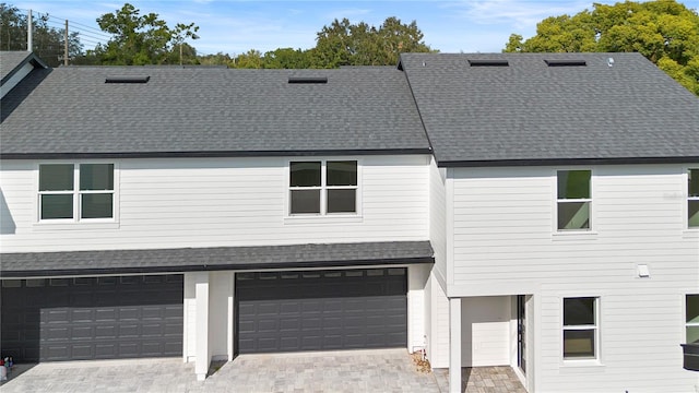 view of front of property featuring a garage