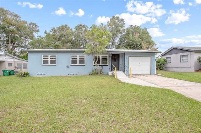 ranch-style home with a front yard and a garage