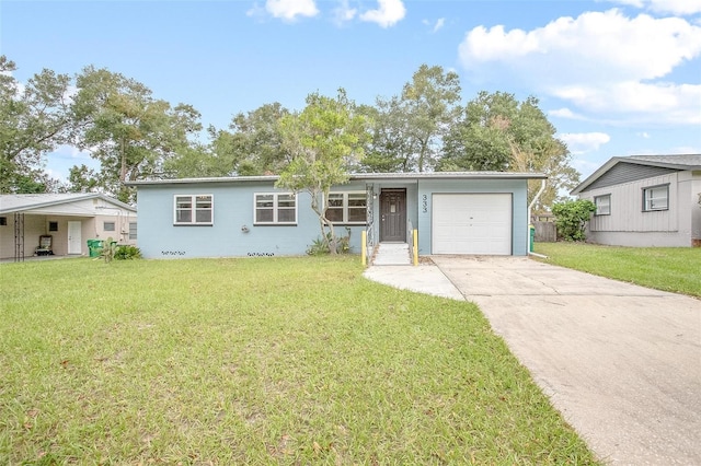 single story home featuring a garage and a front lawn