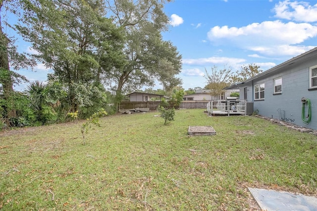 view of yard featuring a deck