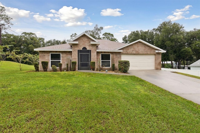 ranch-style house featuring a garage and a front lawn