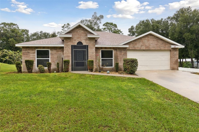 single story home featuring a garage and a front lawn