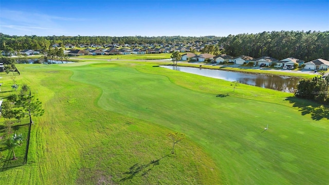 surrounding community with a water view