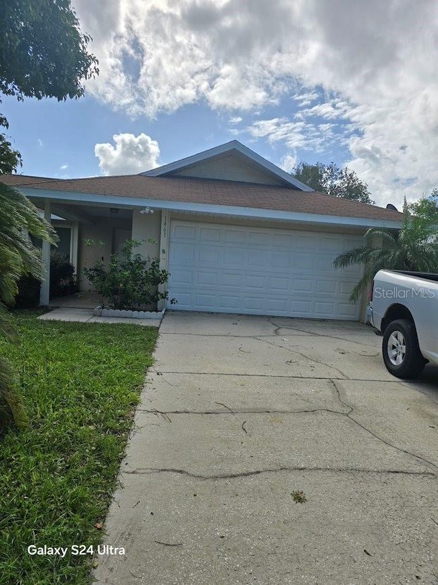 single story home with a garage