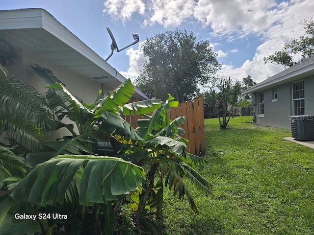 1461 N Felton St, Deltona, FL 32725 - view of yard featuring central AC