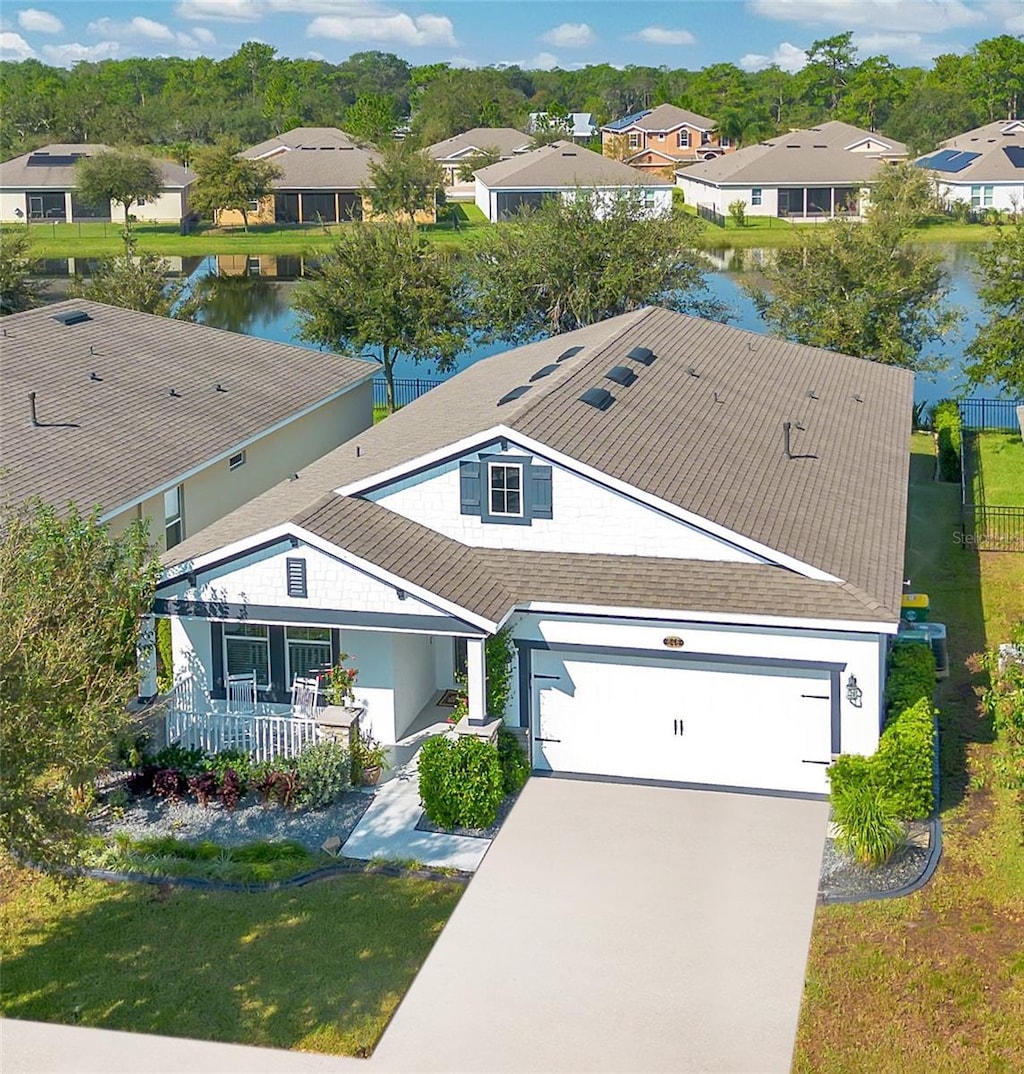 bird's eye view with a water view