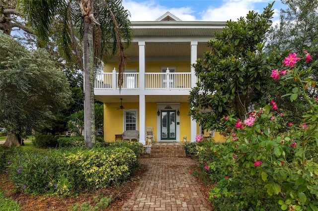 view of front of home with a balcony