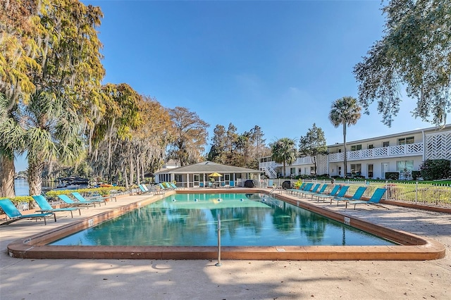 view of swimming pool with a patio