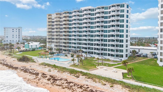 view of property featuring a community pool