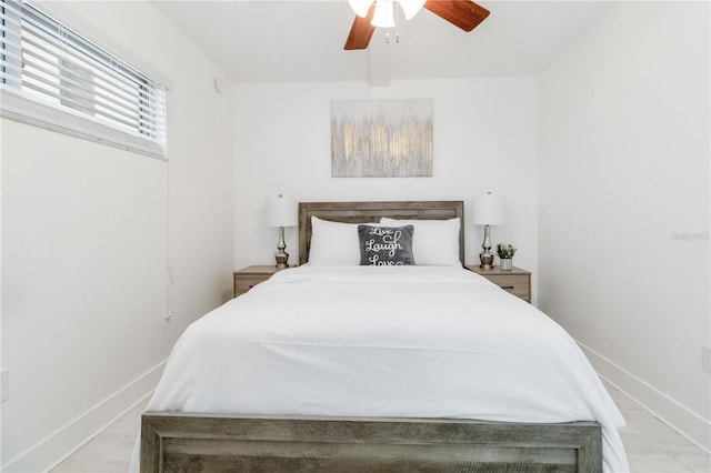 bedroom featuring light wood-type flooring and ceiling fan