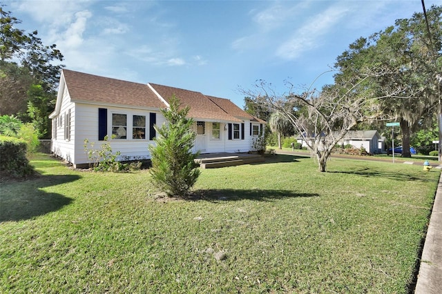 exterior space with a yard