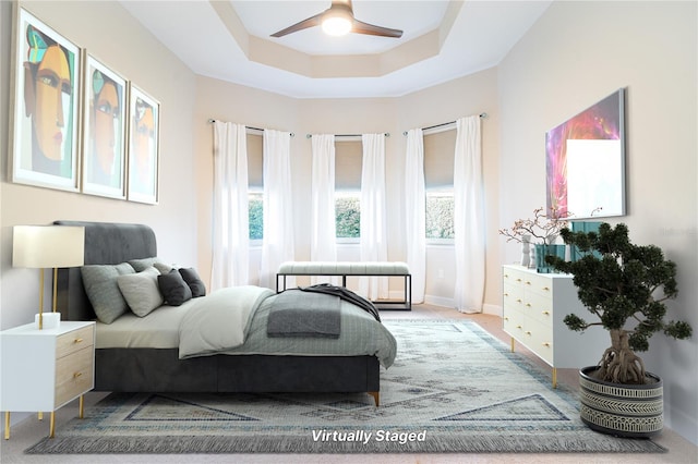 carpeted bedroom with ceiling fan