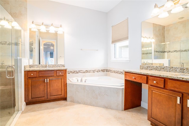 bathroom with vanity, separate shower and tub, and tile patterned flooring