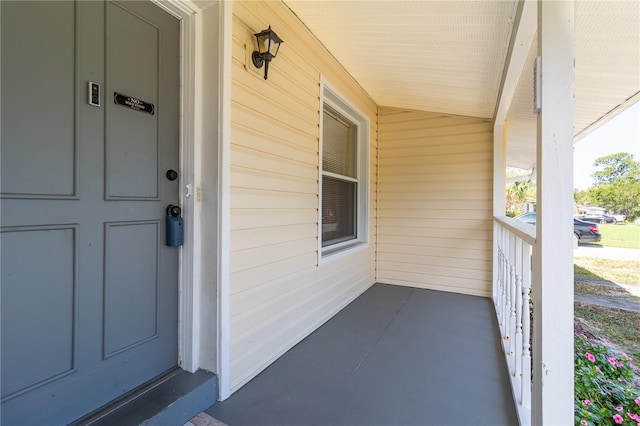 doorway to property with a porch