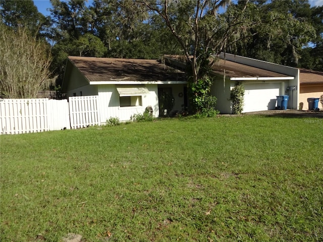 ranch-style house with a front lawn