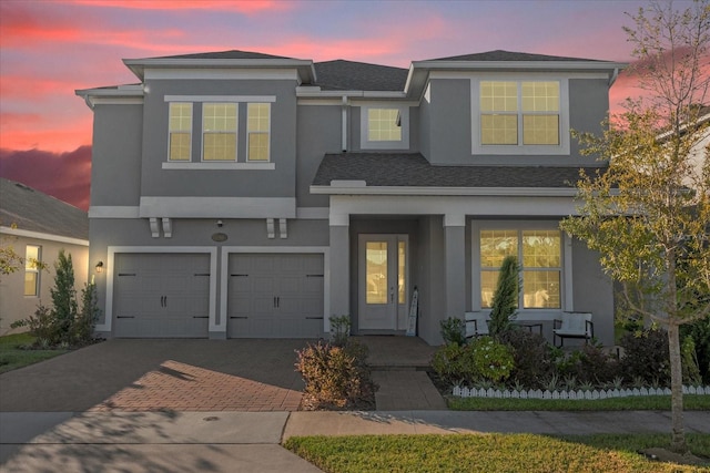 view of front of property featuring a garage