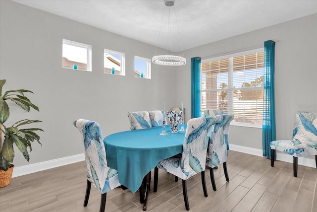 dining area featuring hardwood / wood-style floors