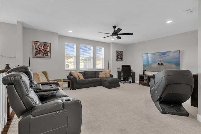 living room with carpet and ceiling fan