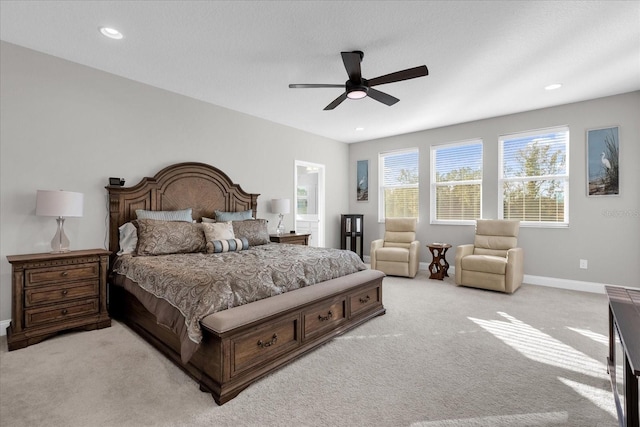 carpeted bedroom with ceiling fan