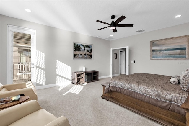 bedroom with ceiling fan, carpet flooring, and multiple windows