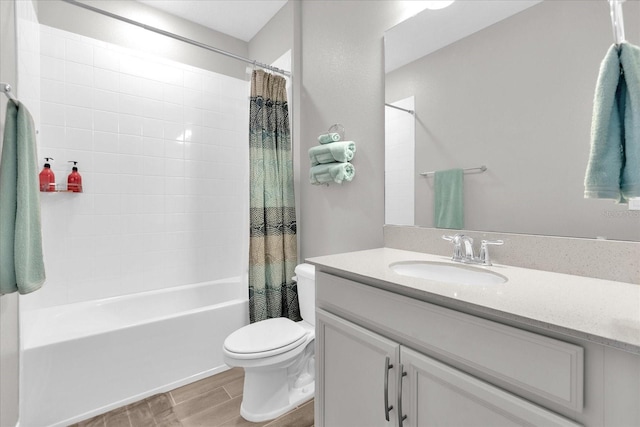 full bathroom with vanity, toilet, shower / tub combo, and hardwood / wood-style floors