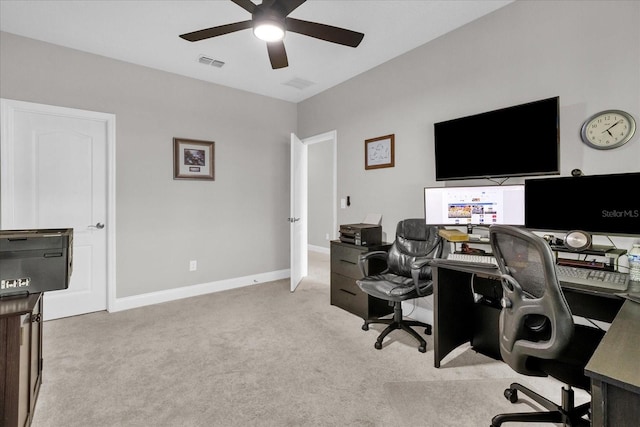 office area featuring ceiling fan and light colored carpet