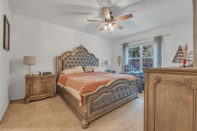 bedroom featuring ceiling fan and light colored carpet