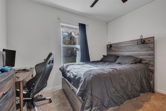 bedroom featuring ceiling fan and carpet floors