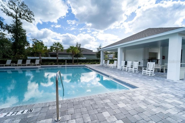 view of pool with a patio area