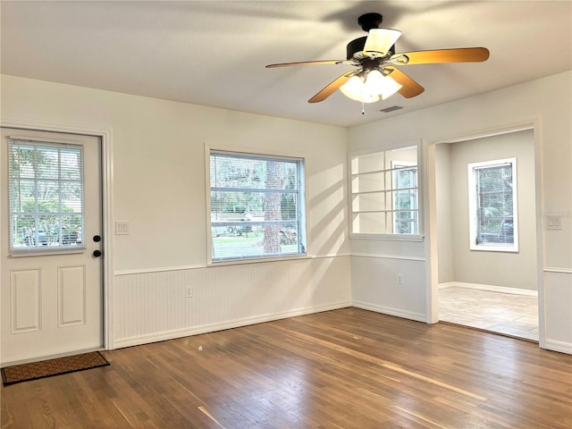 entrance foyer with ceiling fan and dark hardwood / wood-style flooring