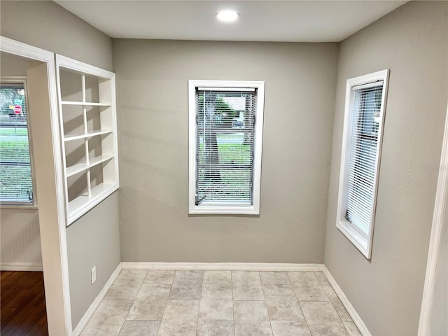 unfurnished room featuring light hardwood / wood-style flooring