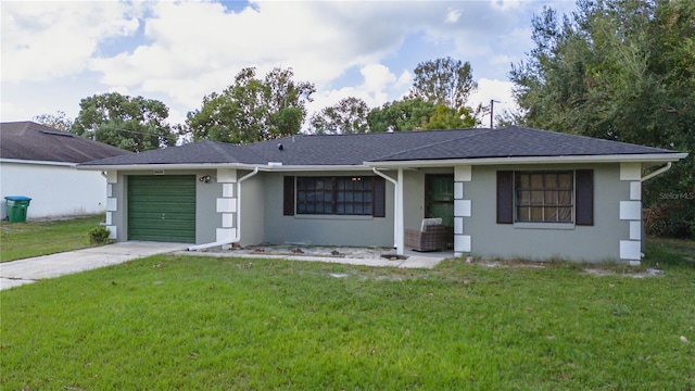 ranch-style house with a front lawn and a garage