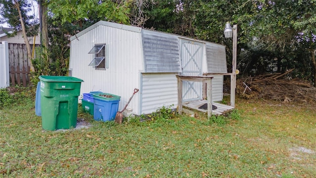 view of outdoor structure featuring a yard