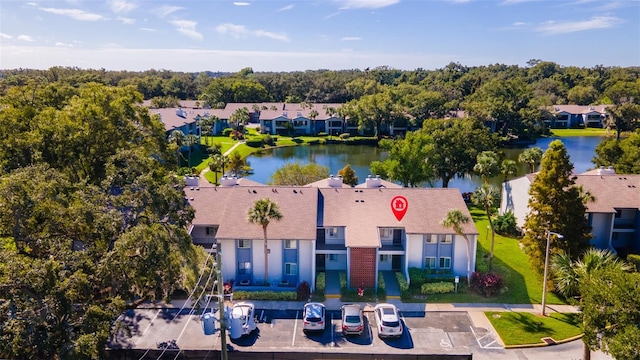 bird's eye view with a water view