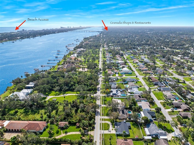 drone / aerial view with a water view