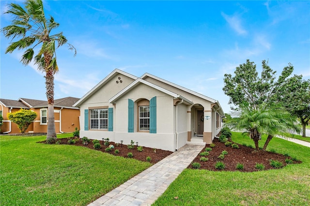 view of front facade with a front yard