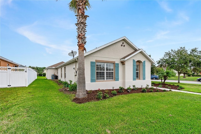 view of front of property with a front lawn