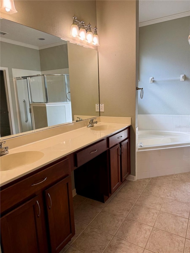 bathroom featuring tile patterned floors, vanity, shower with separate bathtub, and ornamental molding