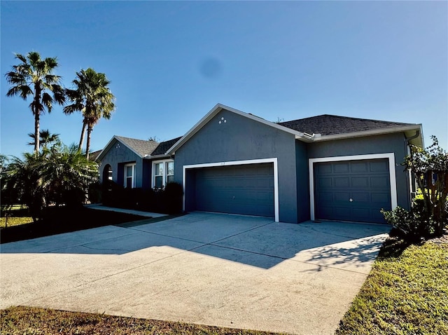 ranch-style home with a garage