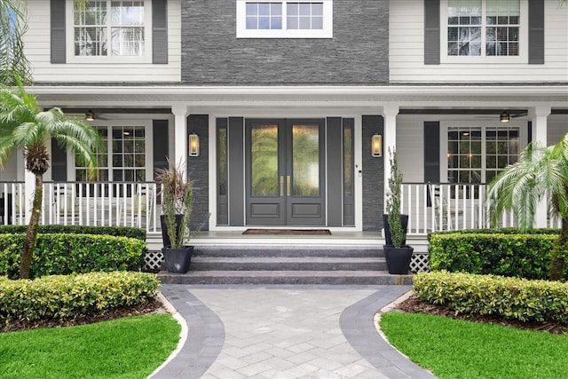 doorway to property with a porch