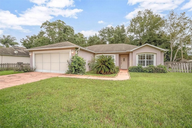 single story home featuring a front lawn and a garage