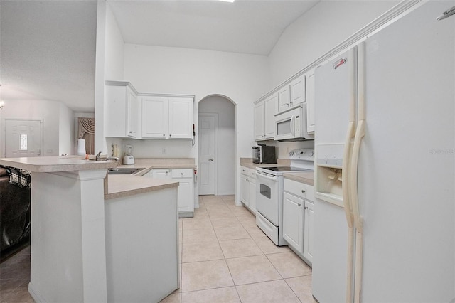 kitchen featuring sink, white cabinets, kitchen peninsula, and white appliances