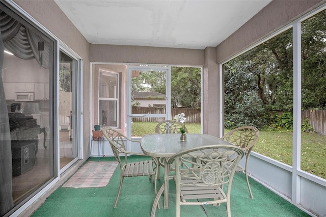 sunroom with plenty of natural light