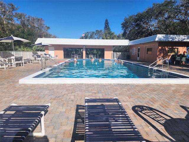 view of swimming pool featuring a patio