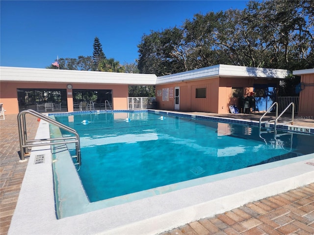 view of swimming pool with a patio