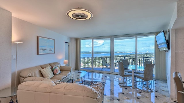 living room with a wall of windows