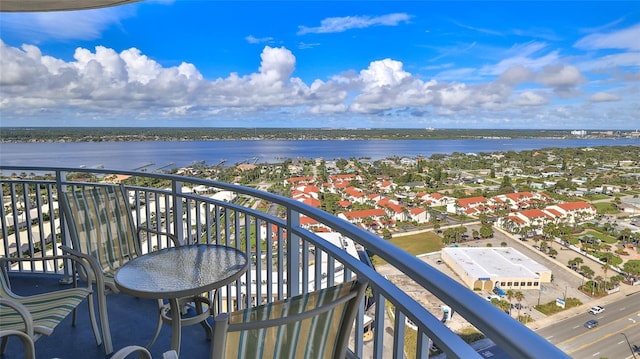 balcony featuring a water view