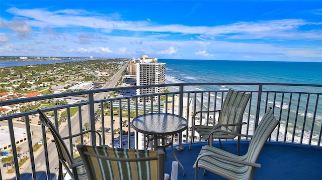 balcony featuring a water view