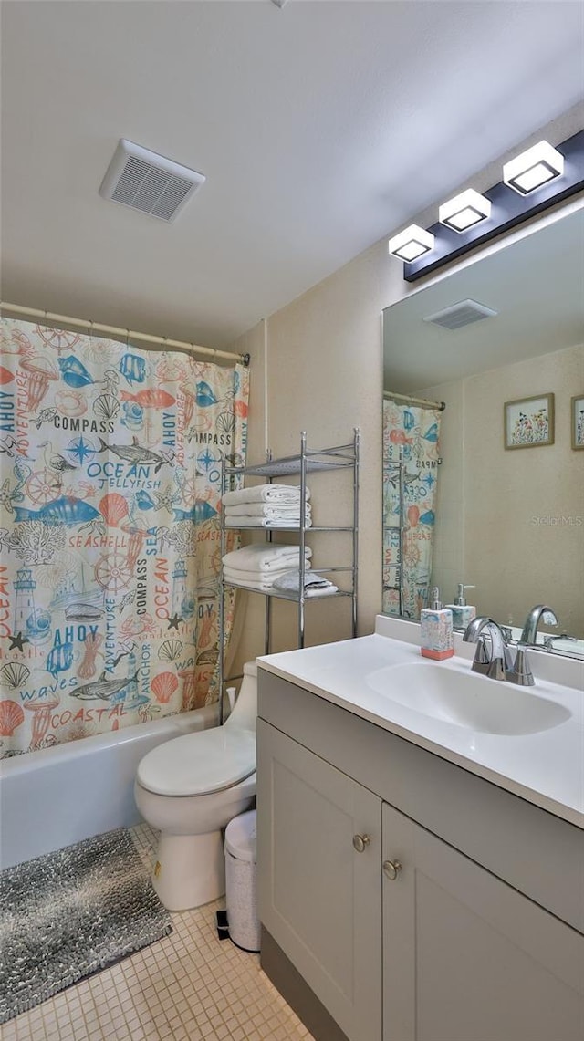 full bathroom with tile patterned flooring, vanity, shower / bath combo, and toilet